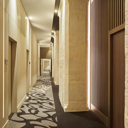 Intercontinental Lyon - Hotel Dieu By Ihg Exterior foto A corridor at the hotel
