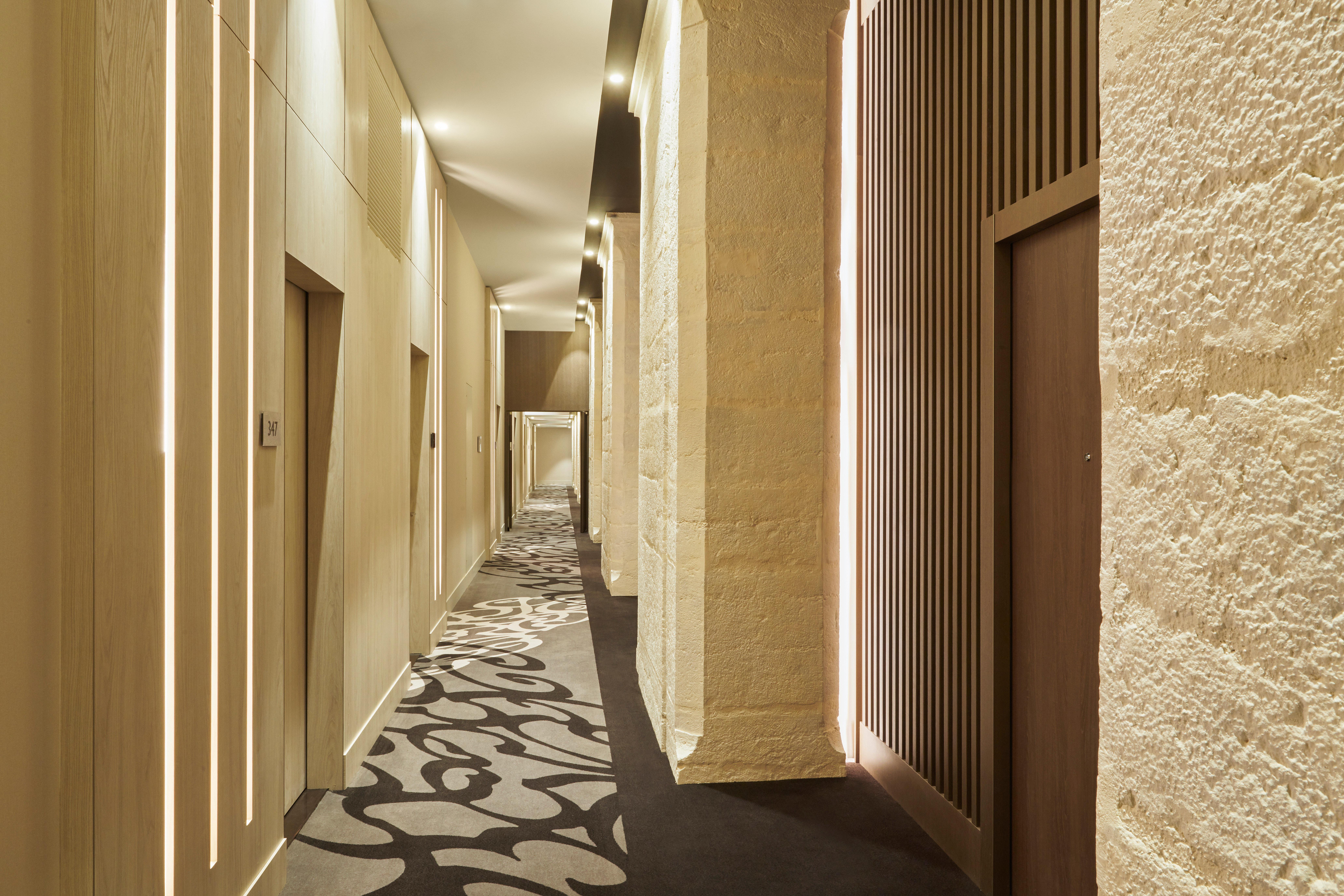 Intercontinental Lyon - Hotel Dieu By Ihg Exterior foto A corridor at the hotel